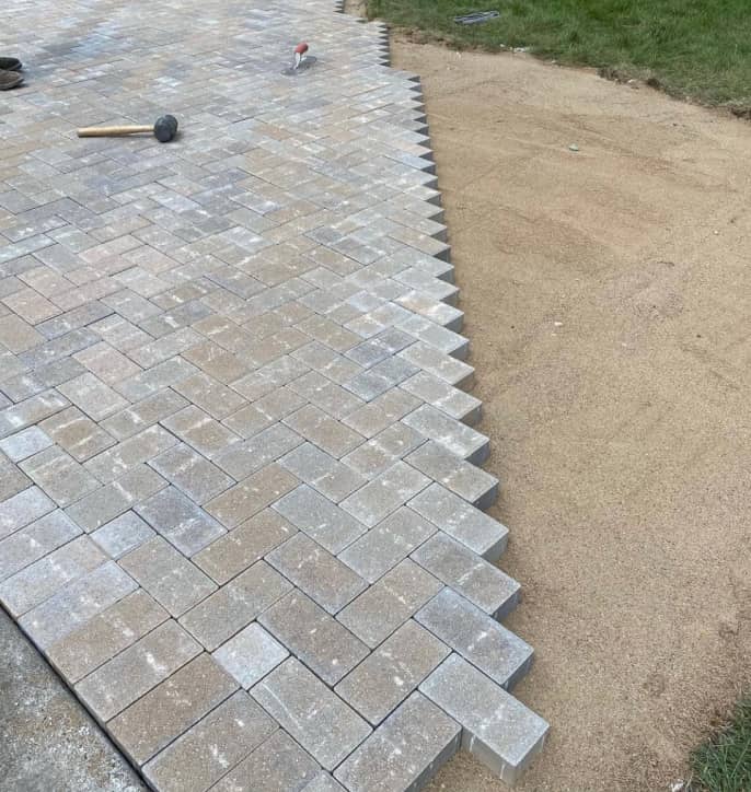 hardscaping of an unfinished project with grey brick