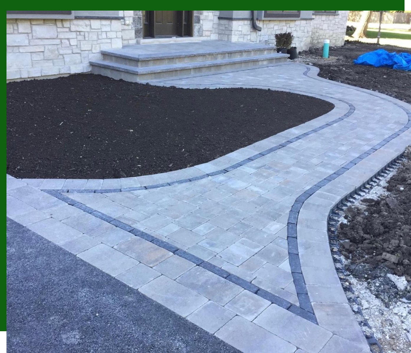 hardscaping walk way with gray pavers for one of our clients